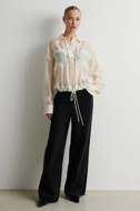Second Female Filea Shirt