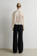 Second Female Filea Shirt